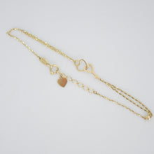 Cargar imagen en el visor de la galería, Pulsera corazón con llave en oro amarillo 14k.