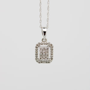 Juego en oro blanco 14k con diamantes.