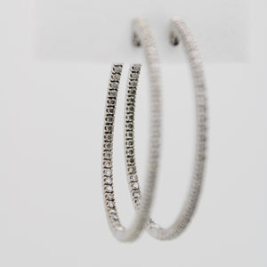 Arracadas en oro blanco 14k con diamantes.