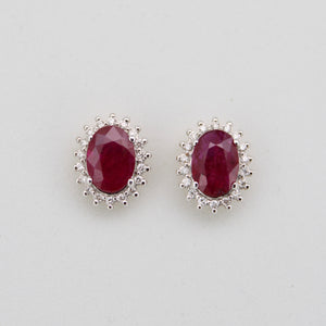 Aretes oro amarillo 14k con rubíes y diamantes.