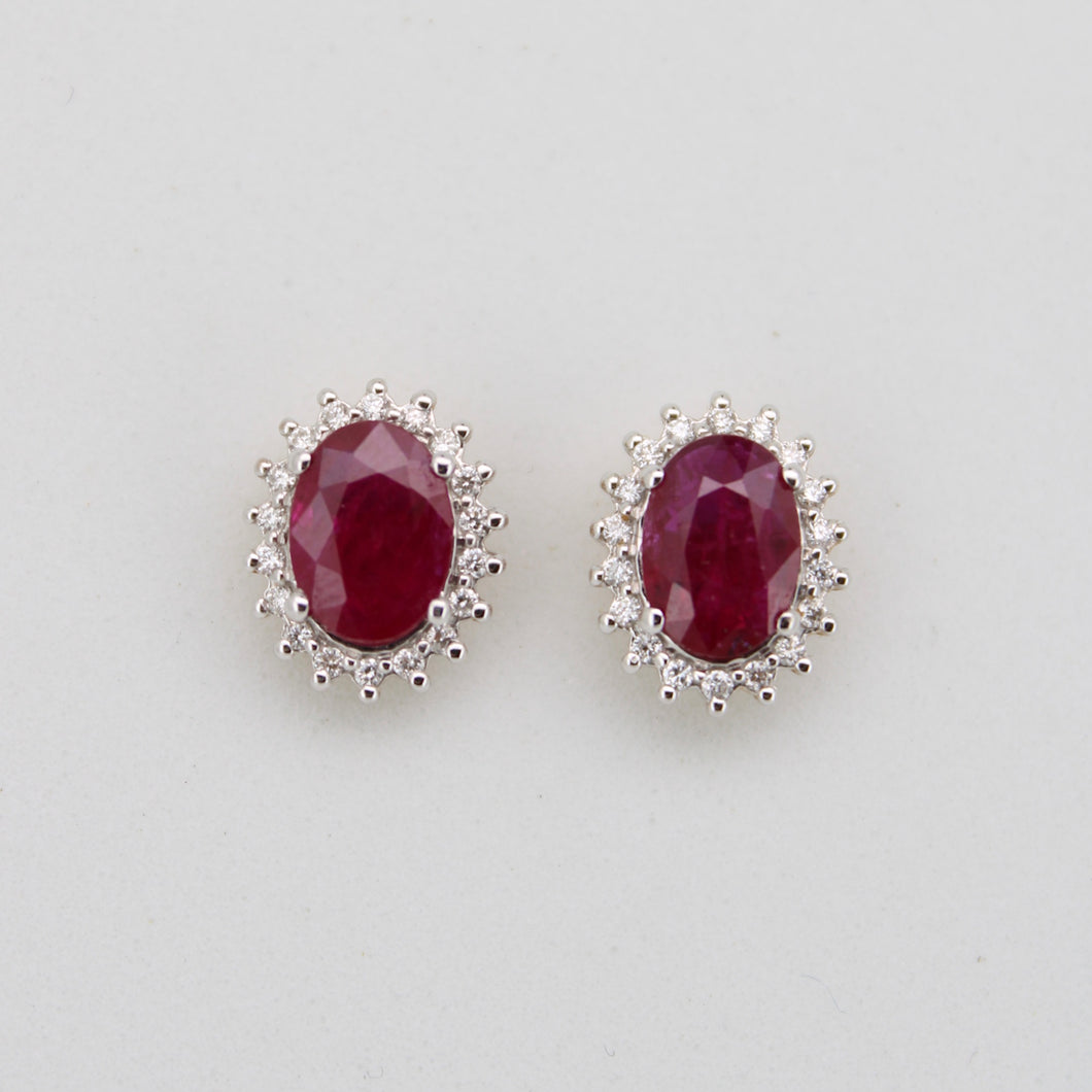 Aretes oro amarillo 14k con rubíes y diamantes.