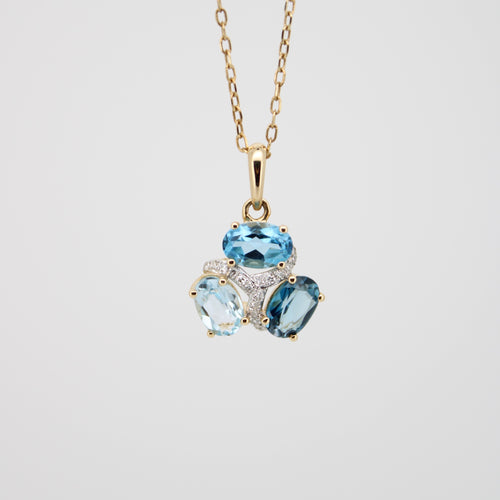 Gargantilla en oro amarillo 14k con topacios y diamantes.