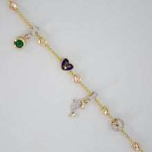 Cargar imagen en el visor de la galería, Pulsera con dijes en oro amarillo 14k con zirconias.