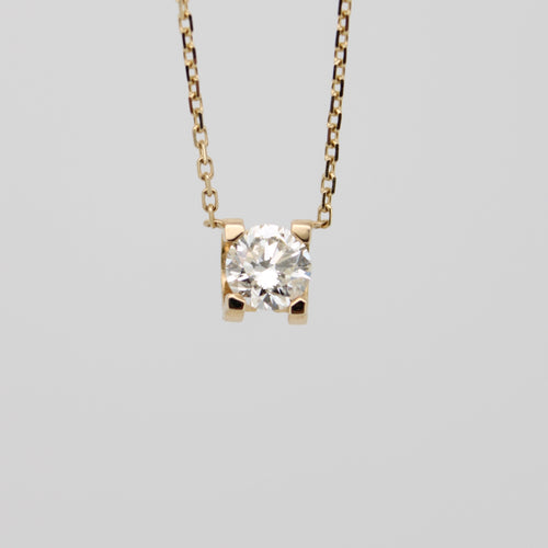 Gargantilla en oro amarillo 14k con diamante.