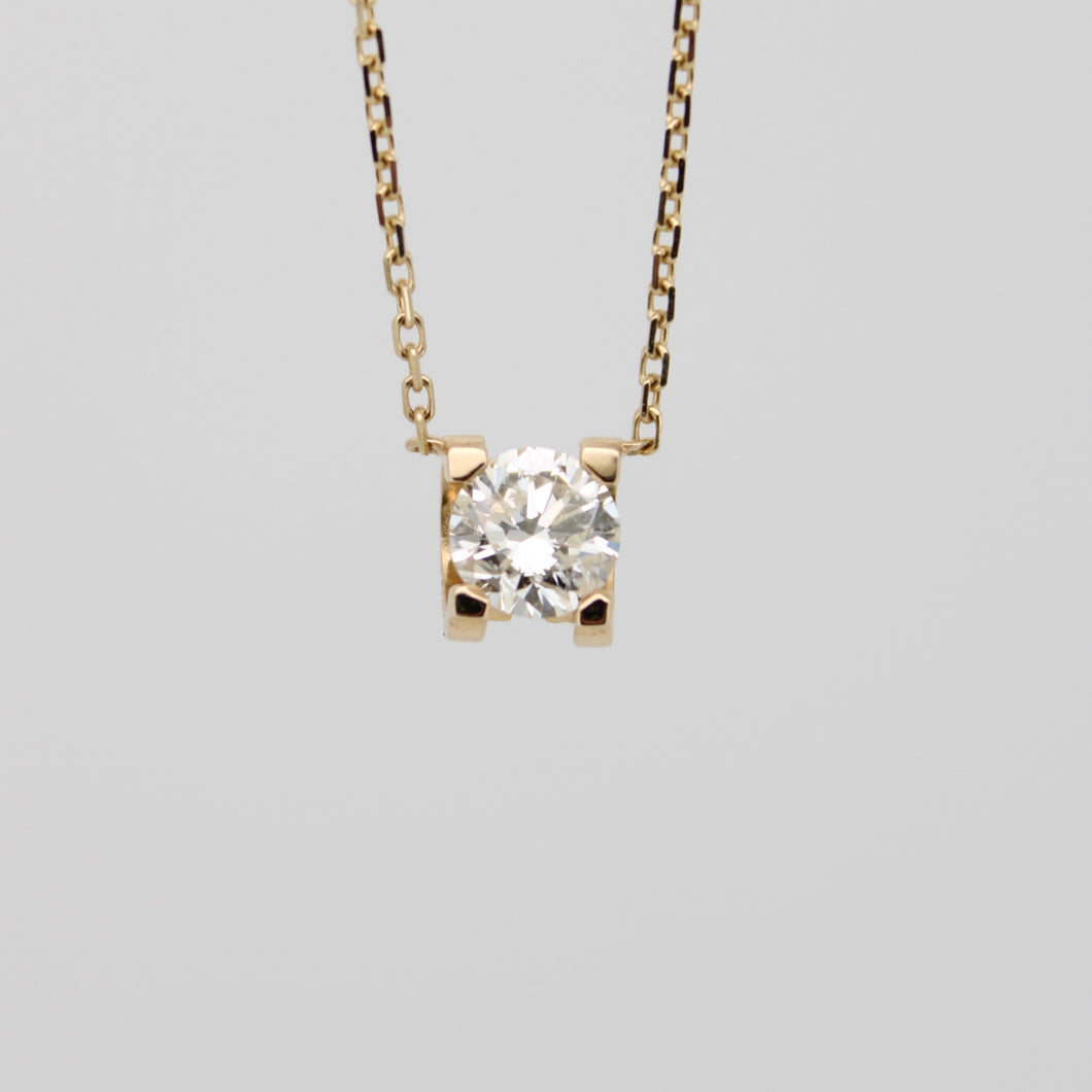 Gargantilla en oro amarillo 14k con diamante.