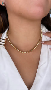 Gargantilla de bolitas en oro amarillo 14k.