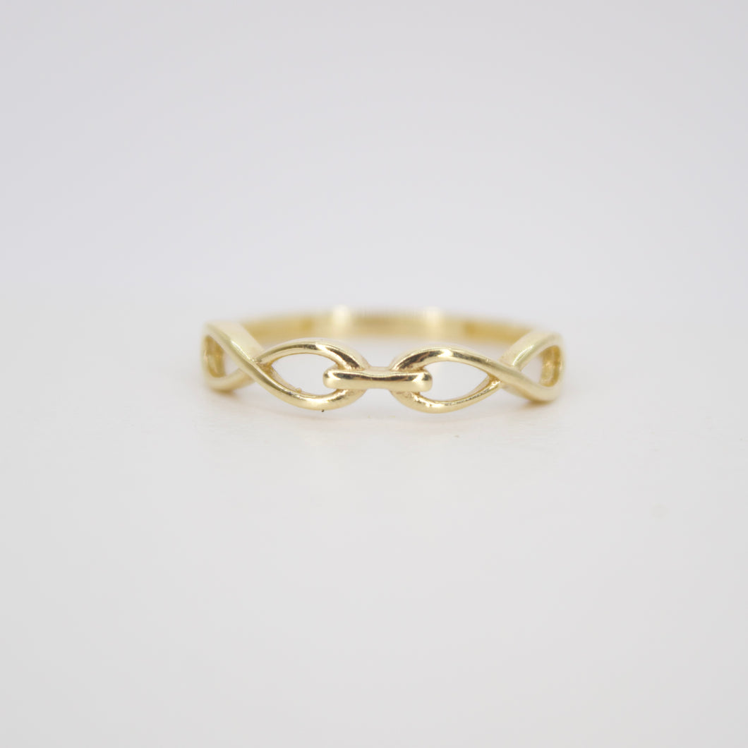 Anillo infinitos en oro amarillo 14k.