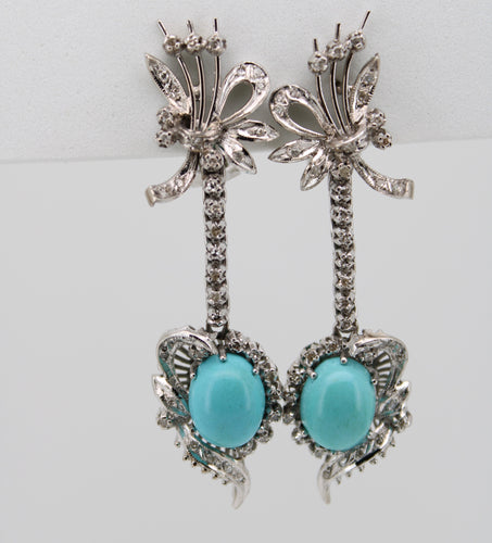 Juego en paladio con diamantes y turquesa.