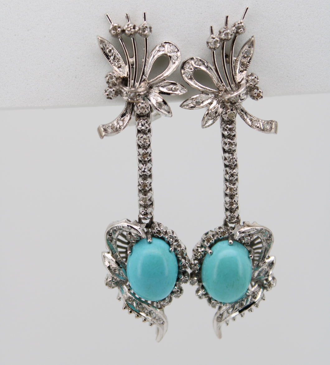 Juego en paladio con diamantes y turquesa.