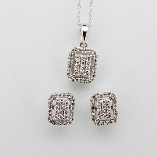Juego en oro blanco 14k con diamantes.