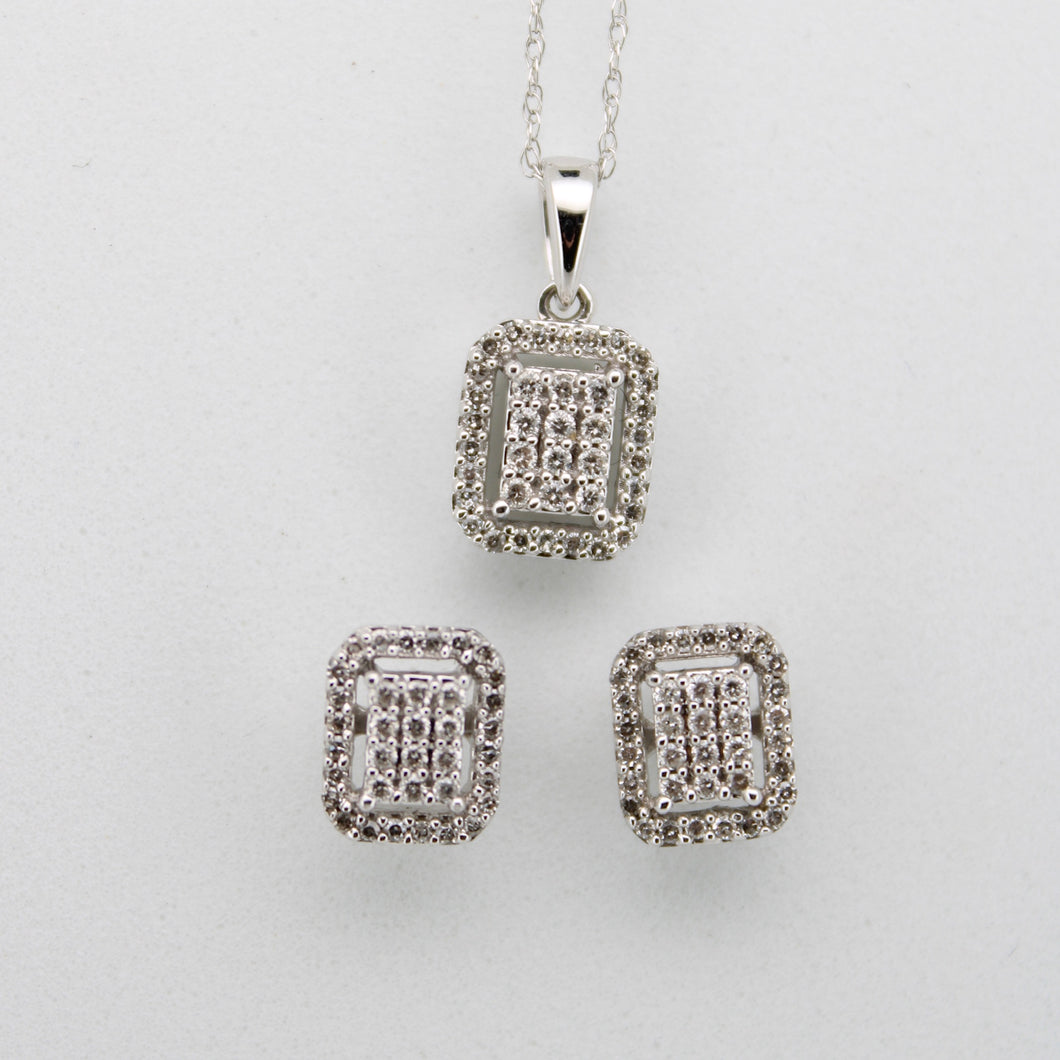 Juego en oro blanco 14k con diamantes.