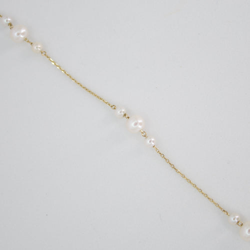 Pulsera con perlas en oro amarillo 14k.
