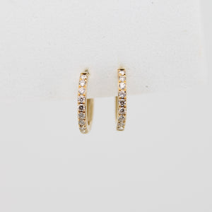 Aretes en oro amarillo 14k con diamantes.