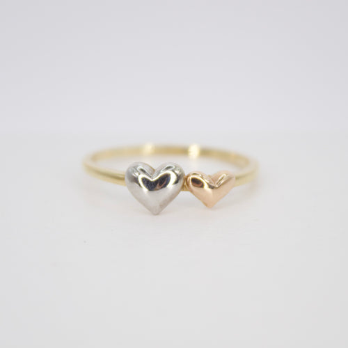 Anillo corazones en oro combinado 14k.