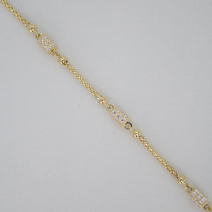 Pulsera en oro amarillo 14k con zirconias.