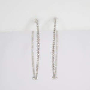 Arracadas en oro blanco 14k con diamantes.