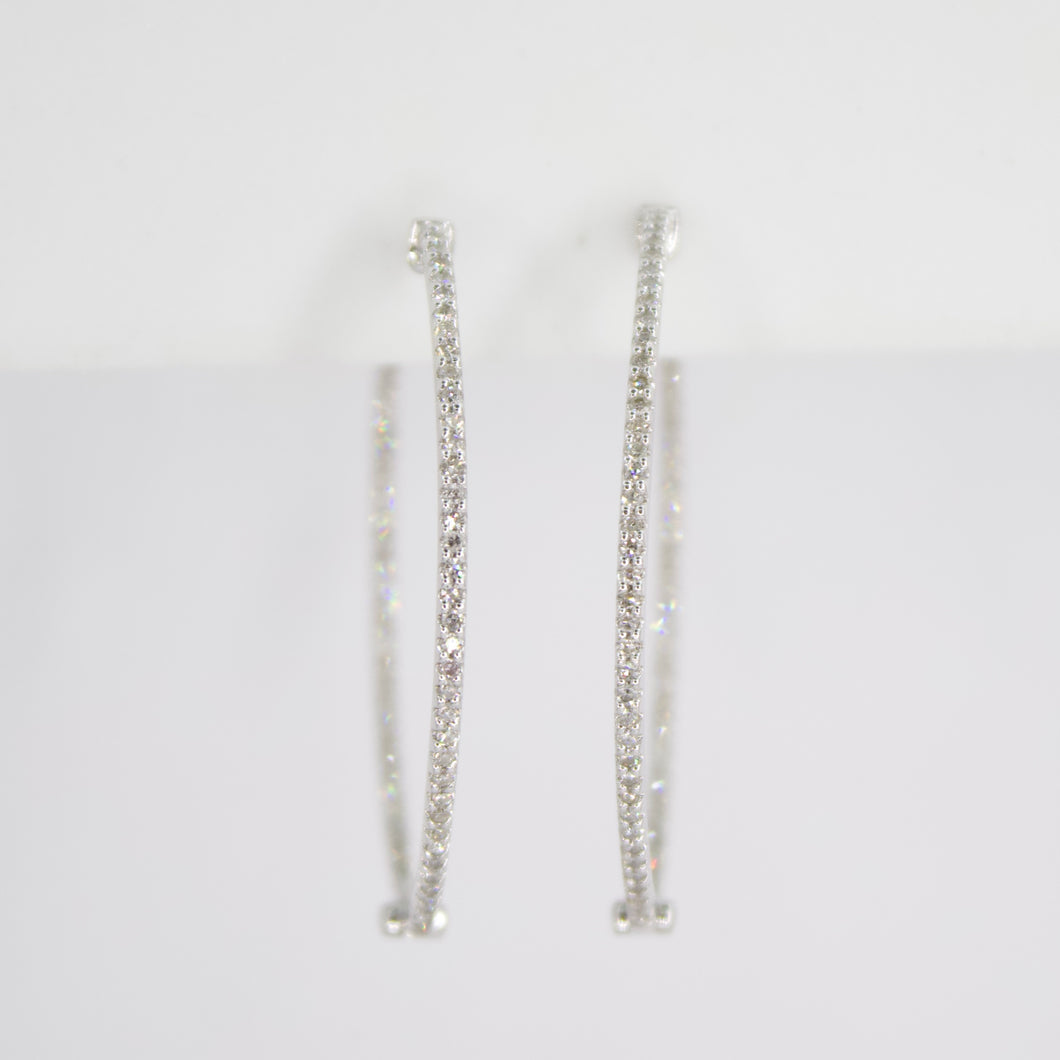 Arracadas en oro blanco 14k con diamantes.