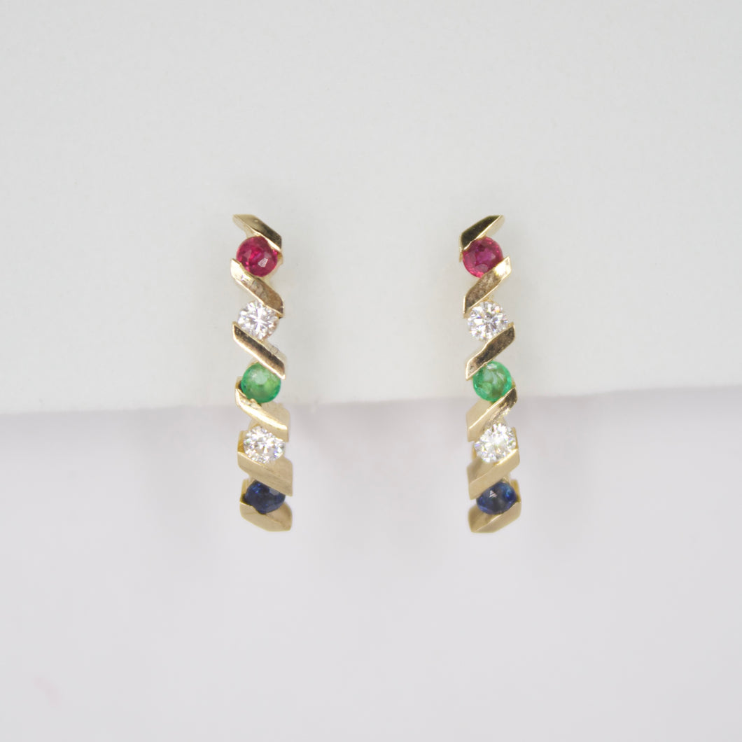 Aretes en oro amarillo 14k con rubí,diamantes,esmeralda y zafiros.
