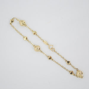 Pulsera de corazones en oro amarillo 14k.