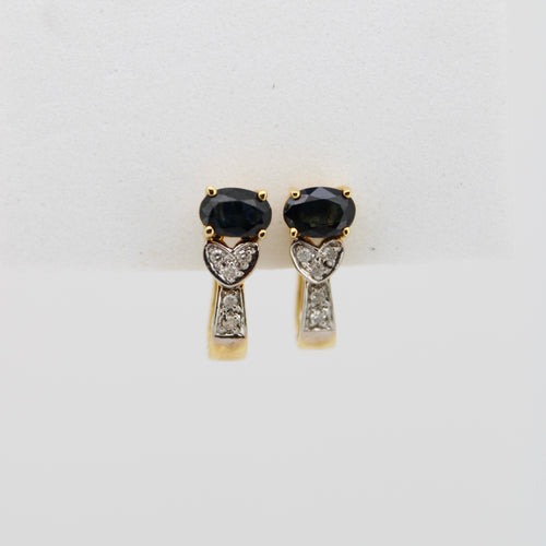 Aretes en oro amarillo 14k con zafiros y diamantes.