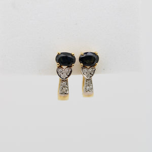 Aretes en oro amarillo 14k con zafiros y diamantes.