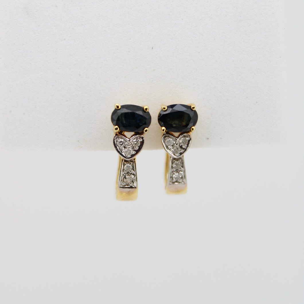 Aretes en oro amarillo 14k con zafiros y diamantes.