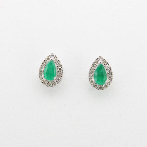 Juego en oro blanco 14k con Esmeralda y diamantes.
