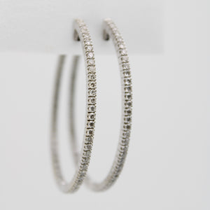Arracadas en oro blanco 14k con diamantes.