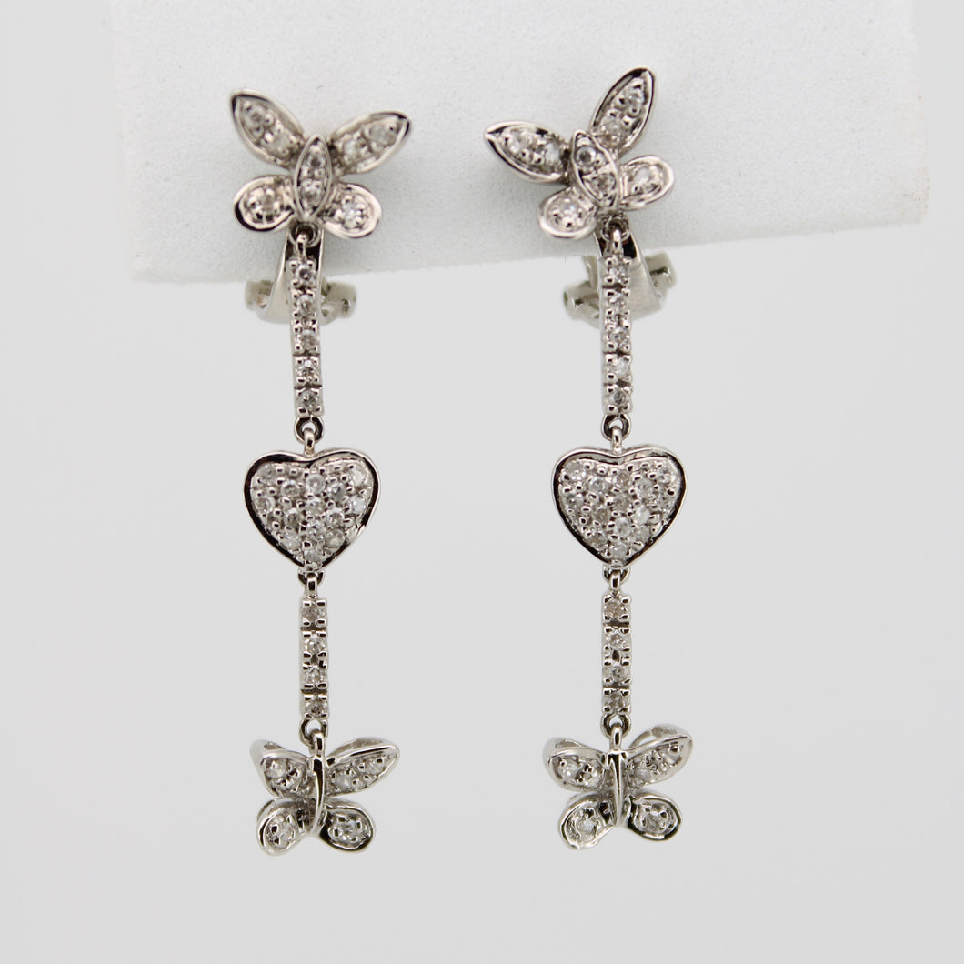 Aretes en oro blanco 14k con diamantes.