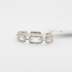 Anillo oro blanco 10k con diamantes.