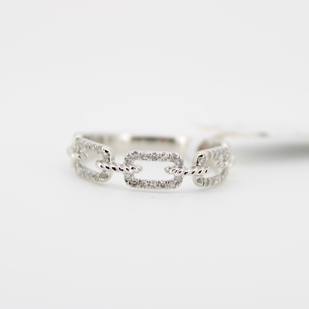 Anillo oro blanco 10k con diamantes.