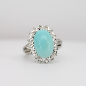 Anillo paladio con diamantes y turquesa.