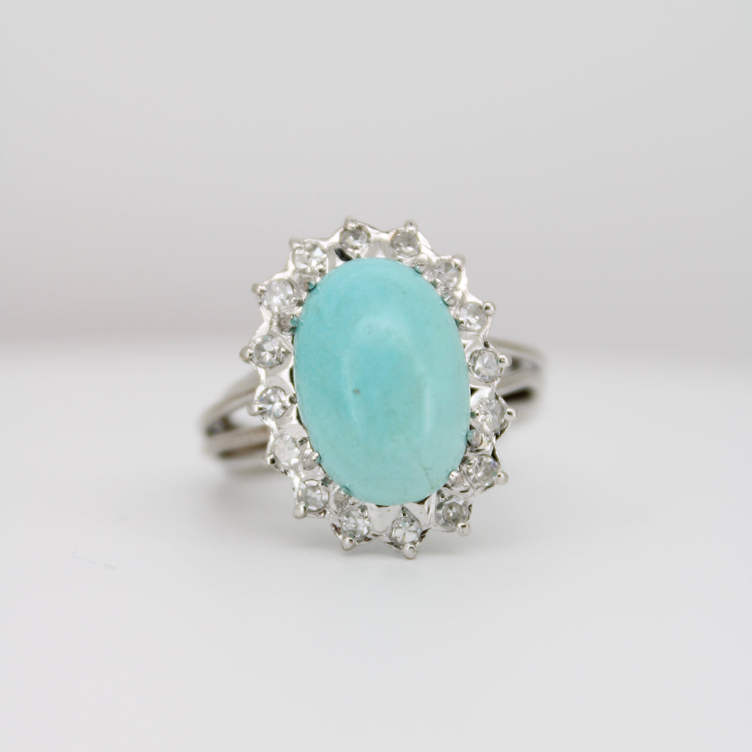 Anillo paladio con diamantes y turquesa.
