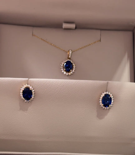 Juego en oro amarillo con zafiros y diamantes