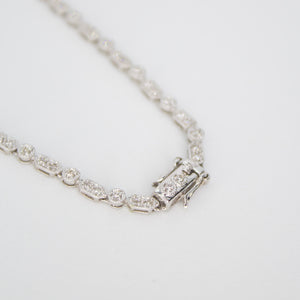 Gargantilla oro blanco 18k con diamantes.