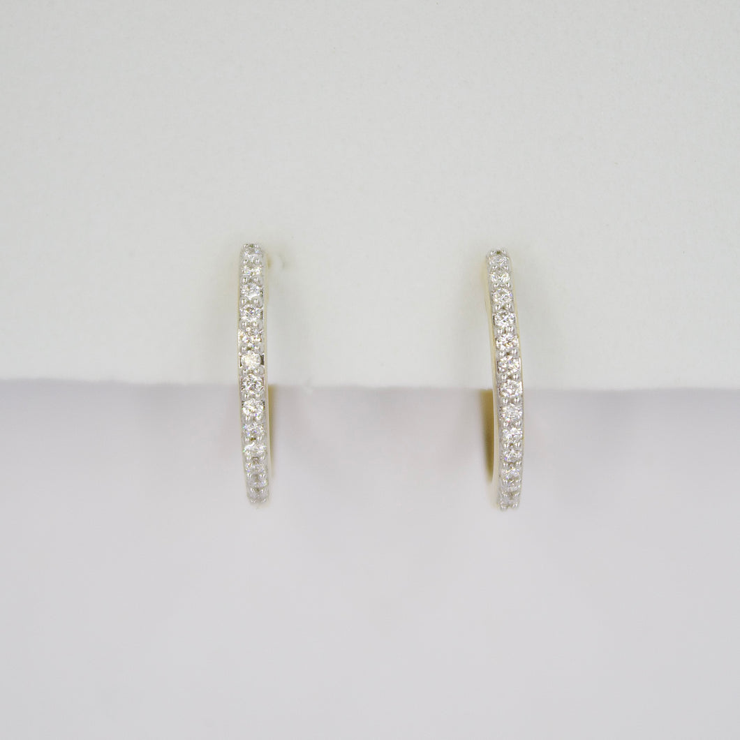 Arracadas en oro amarillo 14k con diamantes.