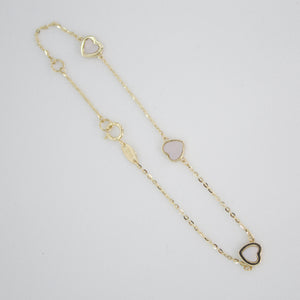 Pulsera corazones en oro amarillo 14k con perla.