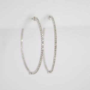 Arracadas en oro blanco 14k con diamantes.