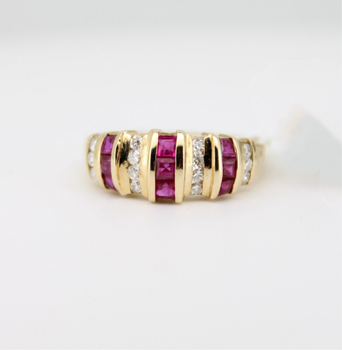 Anillo oro amarillo 14k con rubíes y diamantes