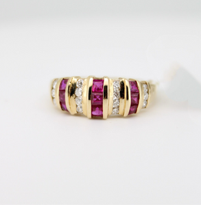Anillo oro amarillo 14k con rubíes y diamantes