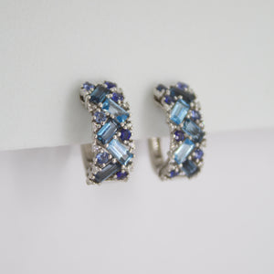 Aretes en oro blanco 14k con topacios y diamantes.