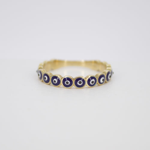 Anillo en oro amarillo 10k con ojos turcos.