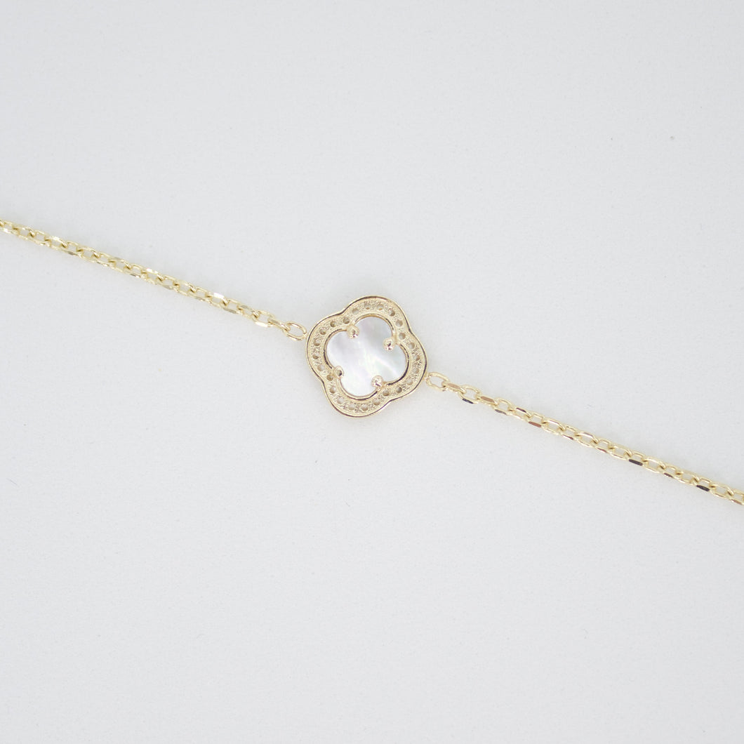Pulsera trébol oro amarillo 14k con perla y zirconias.