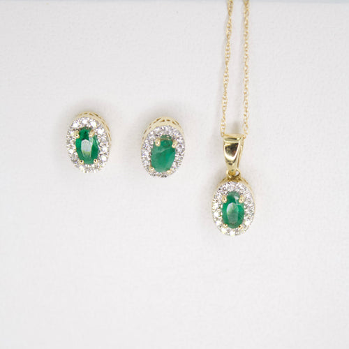 Juego en oro amarillo 14k con esmeralda y diamantes.