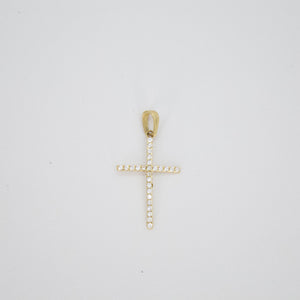 Cruz en oro amarillo 14k con zirconias.