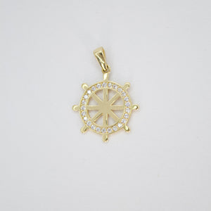 Dije timón en oro amarillo 14k con zirconias.