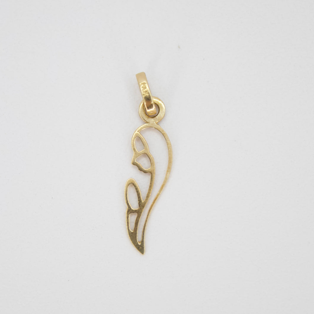 Dije Madonna en oro amarillo 14k.