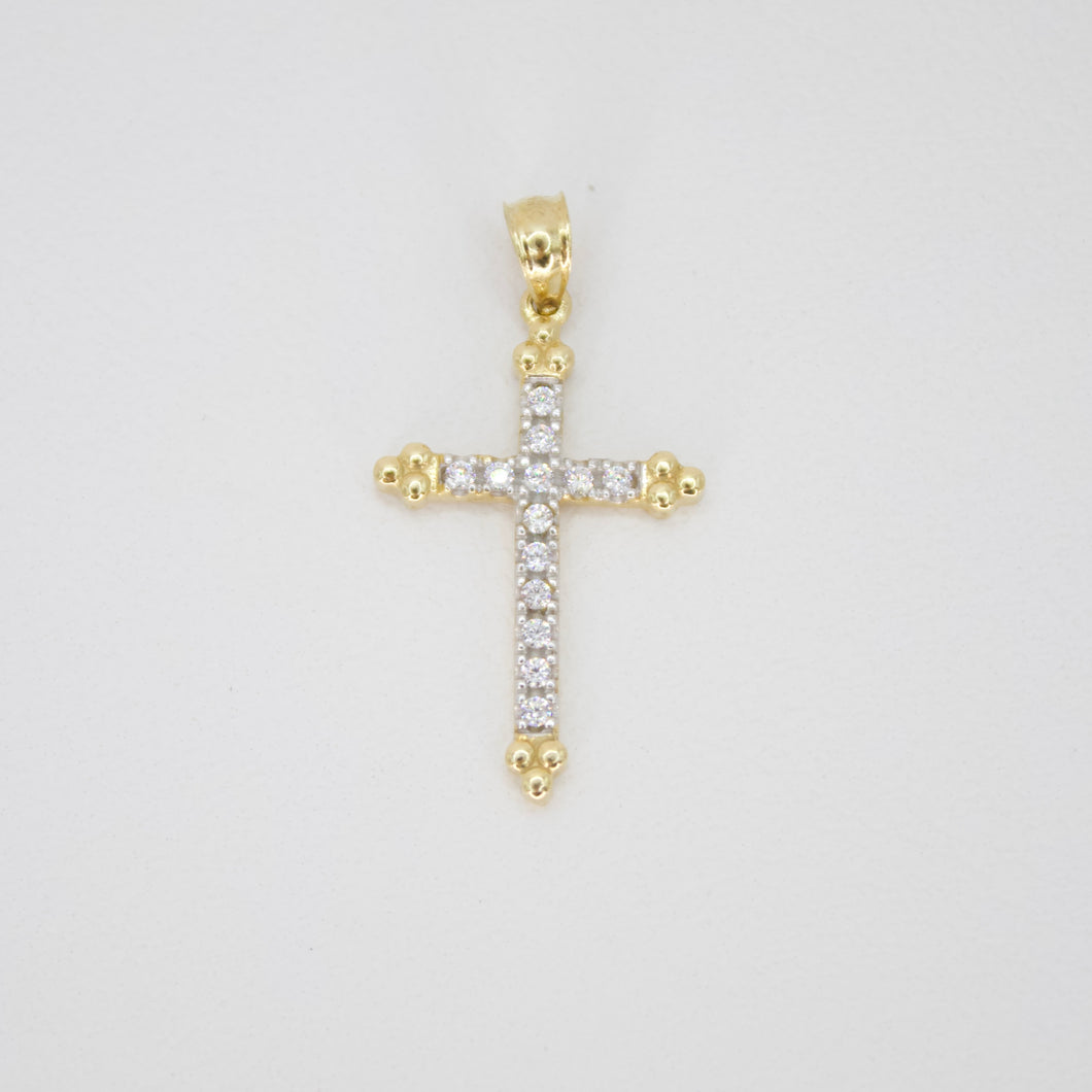 Cruz en oro amarillo 14k con zirconias.