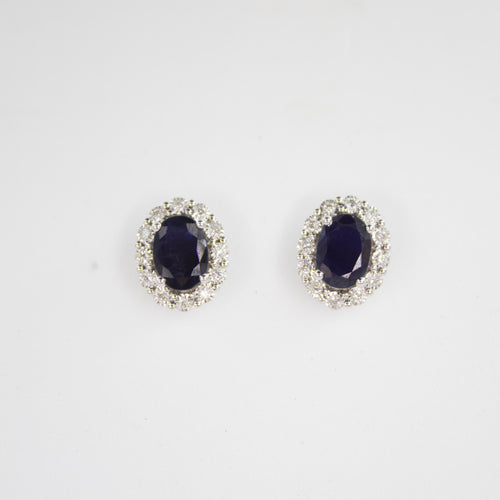 Aretes en oro blanco 14k con zafiro y diamantes..