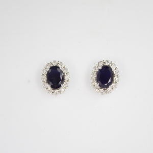 Aretes en oro blanco 14k con zafiro y diamantes..